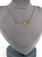 Load image into Gallery viewer, Diamond Tennis Ball Necklace Although delicate in looks - this necklace is light but strong! Each string is defined just like a racket - and the diamond ball shines brightly. Every piece is lovingly made in Los Angeles - and they are my exclusive design. Available in yellow or white gold - this choker is the best seller of all of my fine tennis jewel collection.