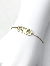 Load image into Gallery viewer, A carefully crafted jewelry piece is made in Los Angeles, designed by Adeline. A reminder for the tennis enthusiast to be kind AND have fun while on the court. Each bracelet is hand cast and then assembled and polished by a fine jewelry artisan. Great care is taken to bring out the shine of the gold. It is solid 14k and made in the United State of America - a unique design by the I Love My Doubles Partner brand of luxury tennis collections.