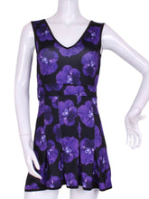 Load image into Gallery viewer, The Angelina Dress is modern yet classy. This style is in our very limited Purple Pansy print, with a flattering v-neck neckline. This soft, silky, and sexy tennis dress has an empire waist and a feminine skirt.
