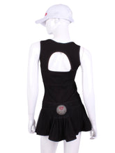 Load image into Gallery viewer, The Sandra Mee Dress offers a playful, fun, and very flirty look. Our dress is fitted, and flares out at the skirt with cute cut out ''O'' in the back. It is perfect for tennis, running and golf (with our Leg Lengthening Leggings), and of course, a trip to your after-court party with your friends. It was designed for confident women like you!