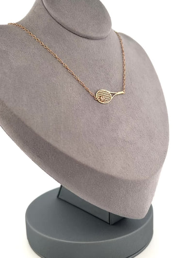 This gorgeous piece has an Italian Rolo chain, with solid gold racket and a brilliant diamond representing the tennis ball.