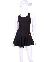 Load image into Gallery viewer, Sexy and soft black tennis dress to wear from the tennis court to cocktails because it's so elegant, comfortable and feminine. Has a unique back tennis net pocket that holds two tennis balls, keeping them dry and behind you when you play.