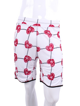 Load image into Gallery viewer, This is our limited edition Men’s Shorts with Raspberry Red Hearts and Net. This piece has a silky and soft fabric. Back pockets to hold tennis balls. We make these in very small quantities - by design. Unique. Luxurious. Comfortable. Cool. Fun.