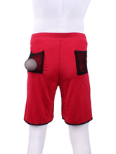 Load image into Gallery viewer, This is our limited edition Short Men’s Shorts Red. This piece has a silky and soft fabric. We make these in very small quantities - by design. Unique. Luxurious. Comfortable. Cool. Fun.