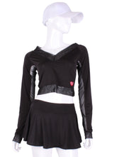Load image into Gallery viewer, Black Vee Crop Top With Mesh. This vee neckline tops arm protection from the sun, but have mesh under the arm to keep you COOL while you play. Designed very short to allow for access to the back pocket on my court to cocktails tennis dresses.