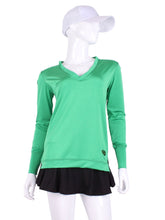 Load image into Gallery viewer, Green Long Sleeve Very Vee Tee. This top is soooo gorgeous! It’s called the Long Sleeve Very Vee Tee - because as you can see - the Vee is - well you know - VERY VEE! For the tennis lady who loves to leave her chest open - but cover her arms (and other bits) this top is seductive in a sweet way! You feel nearly naked in it. So go ahead - hit that ace! Flattering and free - that’s what this top is. The most preppy of my tops - looks just as good tied around the shoulders as it does on!