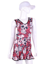 Load image into Gallery viewer, The Angelina Dress is modern yet classy. This style is in our very limited Skull + Roses print, with a flattering vee style neck neckline. This soft, silky, and sexy tennis dress has an empire waist and a feminine skirt. With the exclusive dry ball back pocket - you don't need to tuck your tennis balls into your shorts anymore. Designed by our Founder Adeline in Beverly Hills. Sewn by our team in Downtown Los Angeles.