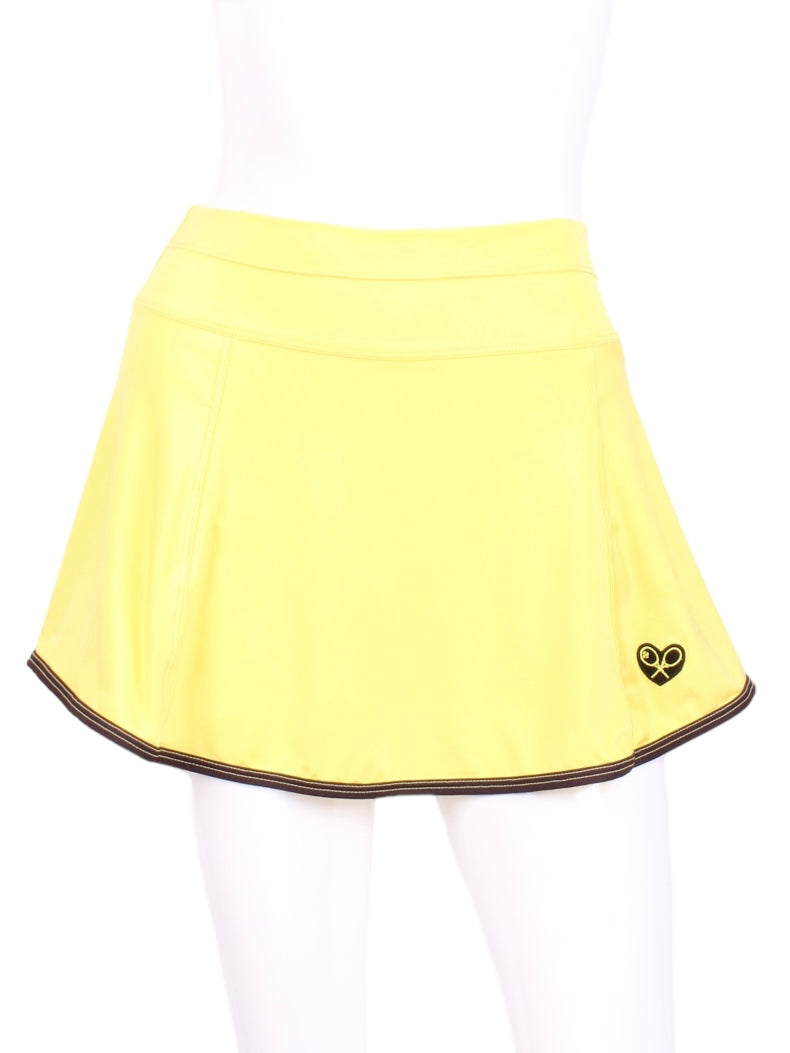This is our limited edition Gladiator Skirt Yellow.  This piece has a silky soft and quick-drying matching shorties, and binding to match.  We make these in very small quantities - by design.  Unique.  Luxurious.  Comfortable.  Cool.  Fun.