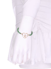 Load image into Gallery viewer, I love tennis.  And gold.  And jewelry.  And my doubles partner!  This bracelet combines all of my loves.  This piece is available with loads of combos - I have shown just a few styles - but contact me for other cord or leather colors.  The heart + rackets are solid 14k gold and my logo design.
