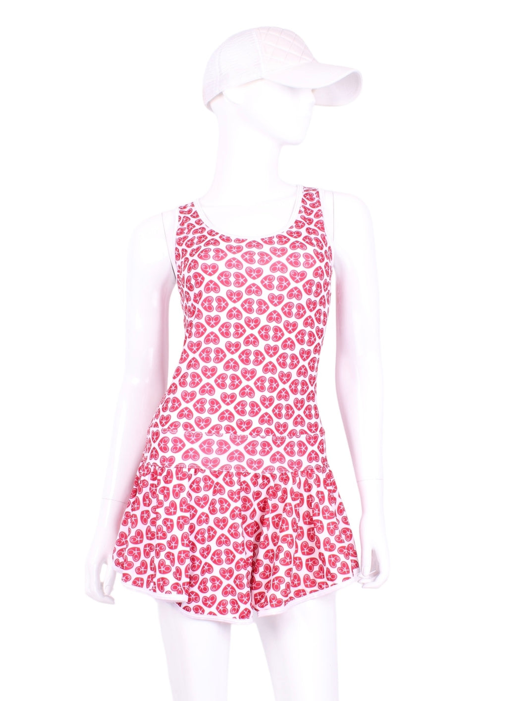 Super fun tiny heart print on this one!  Let the Love Love flow! The Sandra Mee Dress offers a playful, fun, and very flirty look. Our dress is fitted, and flares out at the skirt with cute cut out ''O'' in the back. It is perfect for tennis, running and golf (with our Leg Lengthening Leggings), and of course, a trip to your after-court party with your friends. It was designed for confident women like you!