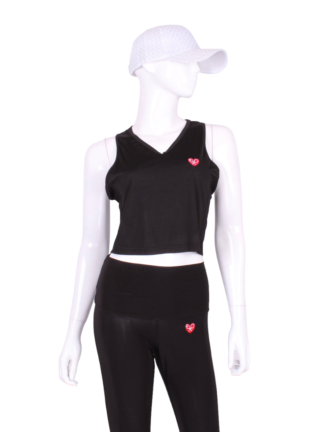 This is my top with the least coverage.  Aptly named the Tiny Tank!  It has a deep scoop neckline and strappy cross back. (If you have boobs....it WILL show your sports bra - if you wear one that is....)