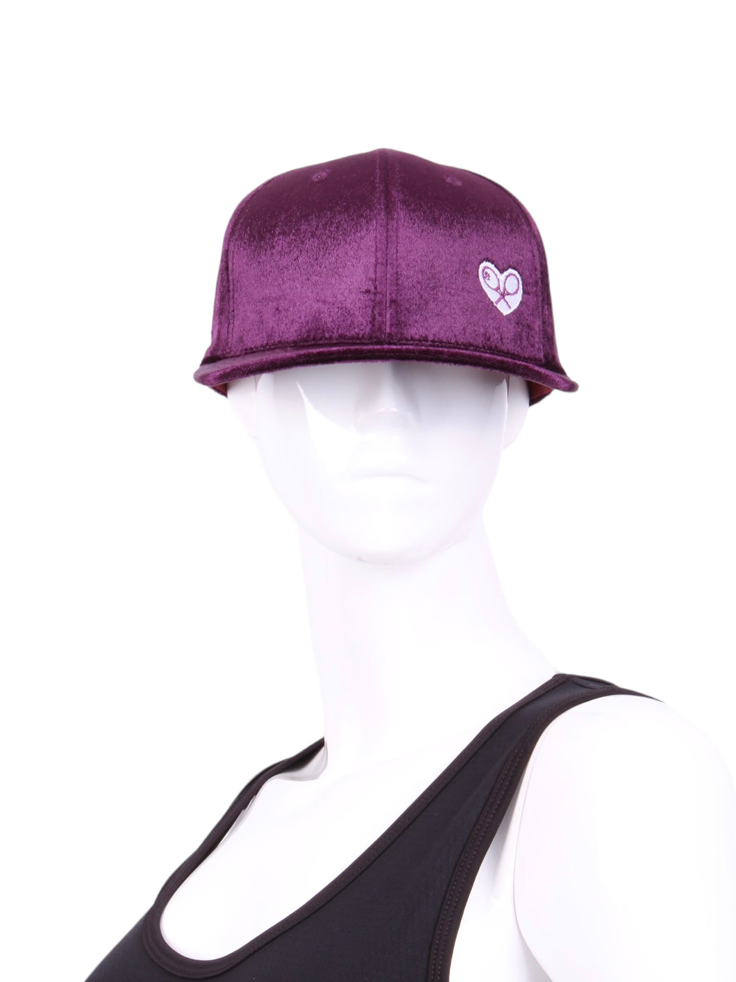 The Purple Velvet Tennis Hat exudes a unique blend of elegance and sporty charm. Crafted from a plush and rich purple velvet material, this hat sets itself apart with its luxurious texture and vibrant color. The velvet fabric catches the light in a way that creates subtle shifts in hue, adding depth to the overall appearance.