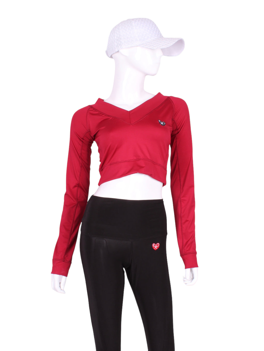 This vee neckline tops arm protection from the sun, but have mesh under the arm to keep you COOL while you play.  These beautiful tops have the Heart + Rackets (trademarked) logo as the contrast.