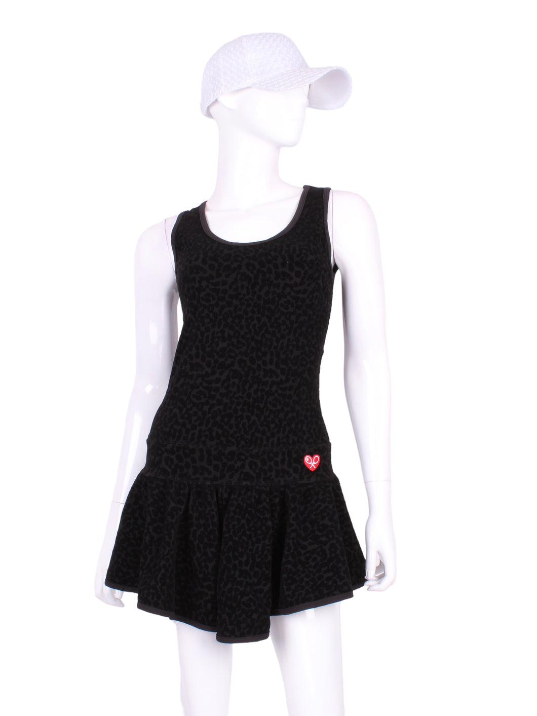 The Sandra Mee Dress offers a playful, fun, and very flirty look. Our dress is fitted, and flares out at the skirt with cute cut out ''O'' in the back. It is perfect for tennis, running and golf (with our Leg Lengthening Leggings), and of course, a trip to your after-court party with your friends. It was designed for confident women like you!