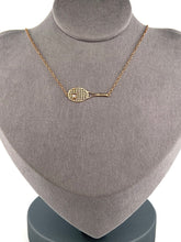 Load image into Gallery viewer, This gorgeous piece has an Italian Rolo chain, with solid gold racket and a brilliant diamond representing the tennis ball.
