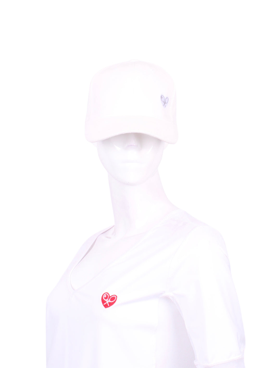 The luxurious White Faux Suede With Silver Heart tennis hat is the epitome of elegance and style on the tennis court. Crafted with the utmost attention to detail, this hat combines comfort, functionality, and a touch of opulence.