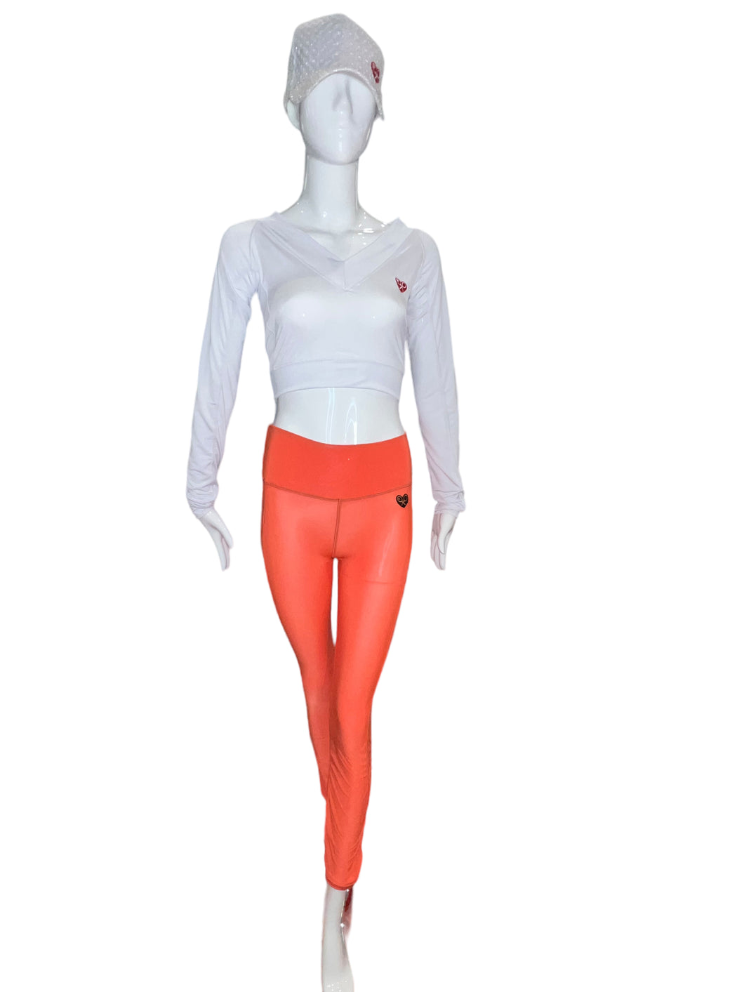 This vee neckline tops arm protection from the sun. Designed very short to allow for access to the back pocket on my court to cocktails tennis dresses. Soft and silky fabric.