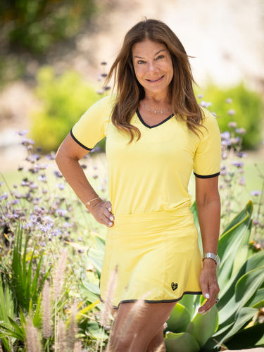 UNISEX! Yellow Vee neck short sleeve t-shirt.  Super soft and comfortable fabric. A cute T-Shirt with our logo on the left shoulder.  Feel confident and stay cool on the court together with your doubles partner. Comes in multiple colors!