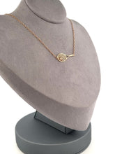 Load and play video in Gallery viewer, This gorgeous piece has an Italian Rolo chain, with solid gold racket and a brilliant diamond representing the tennis ball.
