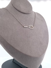 Load and play video in Gallery viewer, This gorgeous piece has an Italian Rolo chain, with solid gold racket and a brilliant diamond representing the tennis ball.
