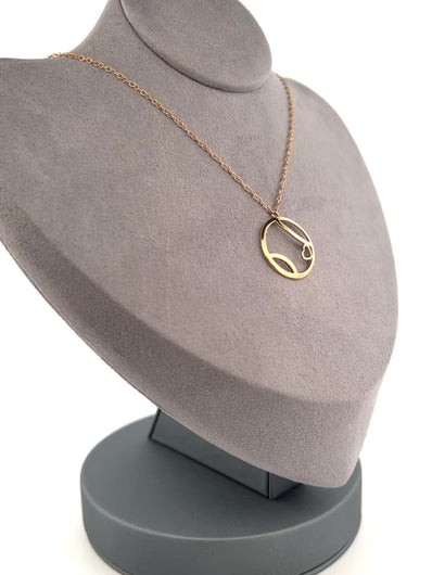 A gorgeous Ball + Heart Solid Gold Necklace.  Light enough to play in!  Strong enough to last forever!