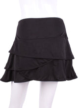 Load image into Gallery viewer, The all new Layer Skirt is high waisted and has layers of fabric going down.  With soft shorts underneath - it&#39;s the perfect compliment to your tennis game.
