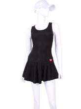 Load image into Gallery viewer, Sexy and soft black tennis dress to wear from the tennis court to cocktails because it&#39;s so elegant, comfortable and feminine.  Has a unique back tennis net pocket that holds two tennis balls, keeping them dry and behind you when you play.
