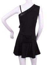 Load image into Gallery viewer, The Charmaine Court To Cocktails Tennis Dress in Black. Flirty and alluring.  That&#39;s the Charmaine tennis dress.  Wear this sexy dress from the court to cocktails.  The off the shoulder neck, asymmetrical lines, and side slit make this our most sexy dress.  It is a fitted cut, but lined to give support, and is sewn with our silky soft stretchy fabric.  This dress is short, it sits high on the thigh.  This dress comes with its own one-sided matching soft bra to wear underneath.
