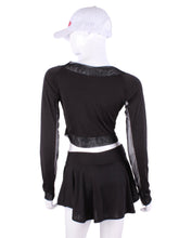 Load image into Gallery viewer, Black Vee Crop Top With Mesh. This vee neckline tops arm protection from the sun, but have mesh under the arm to keep you COOL while you play.    Designed very short to allow for access to the back pocket on my court to cocktails tennis dresses.
