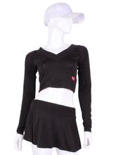 Load image into Gallery viewer, Black Vee Crop Top. This vee neckline tops arm protection from the sun, but have mesh under the arm to keep you COOL while you play.    Designed very short to allow for access to the back pocket on my court to cocktails tennis dresses.
