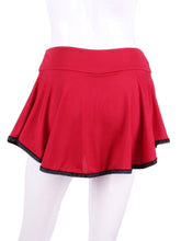 Load image into Gallery viewer, The bottom of the skirt is finished with binding - with two needle cover stitch - this makes it look like a piece of art.  My masterpiece.  As with all of my designs - cool machine wash - and it hangs dry super soft - no need to tumble it.  For the busy and elegant tennis woman.  This limited edition collection has a black heart (black rackets) on the red skirt and the red heart (black rackets) on the black skirt.
